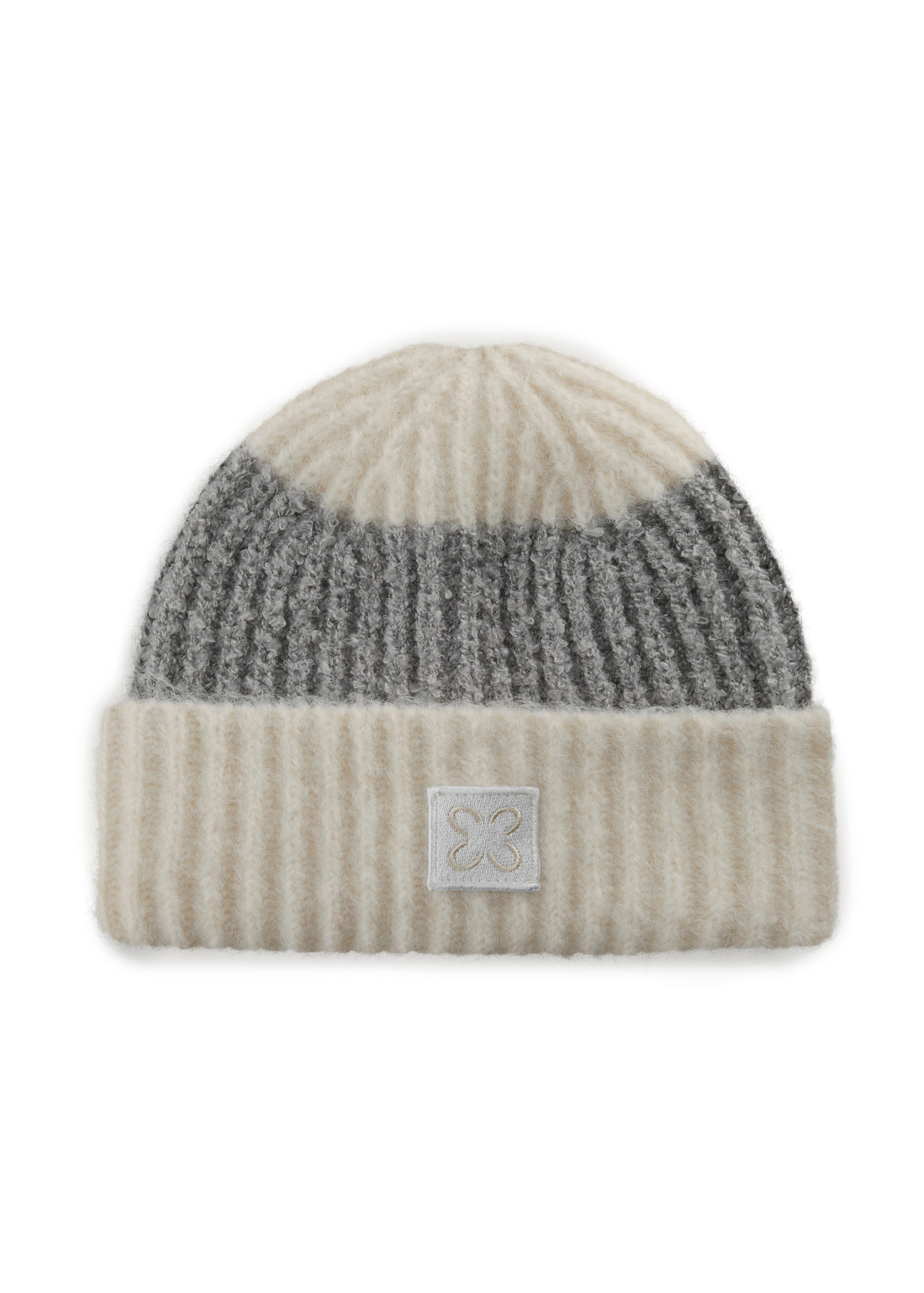 Kuschelige Mütze aus Bouclé- und Rippstrick